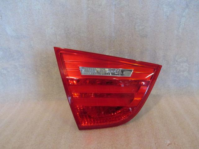 Oem 09 10 11 bmw 328i 335i m3 sedan drivers taillight genuine factory oem (left)