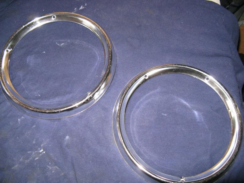  1963 ford tail light trim rings with very good rubbers   