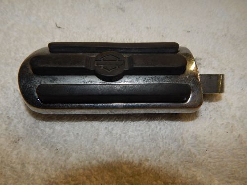 Universal front foot peg for motorcycles with changeable adapter.