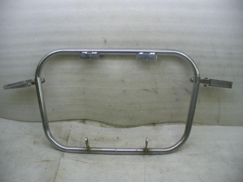 Vintage 70's asian universal fit front guard with hiway pegs.