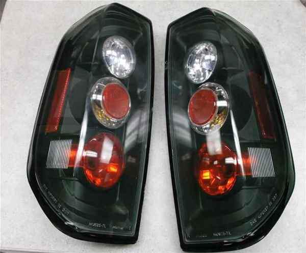 Aftermarket altezza style smoke euro tail lights for frontier