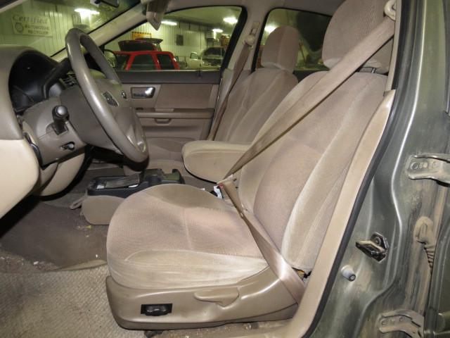 2001 ford taurus front center lap seat belt only tan