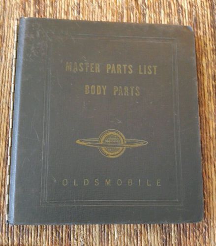 1932-1953 oldsmobile master parts list body parts! original saturn logo binder!