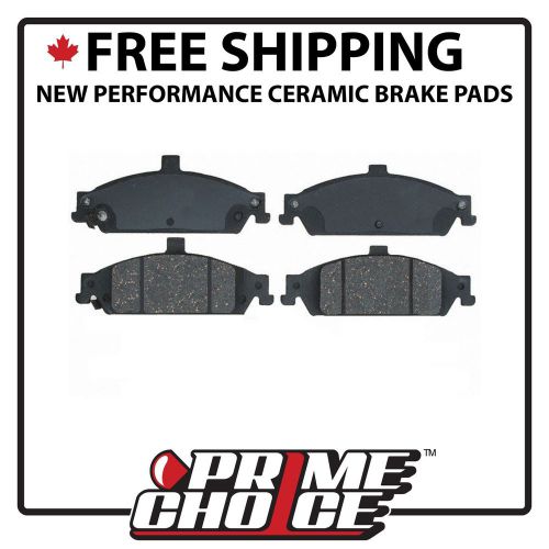 Set of performance front ceramic disc brake pads with rubberized shims pcd727