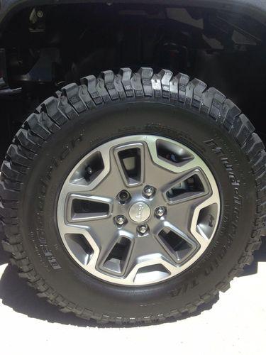 Jeep rubicon stock tires and rims 2014