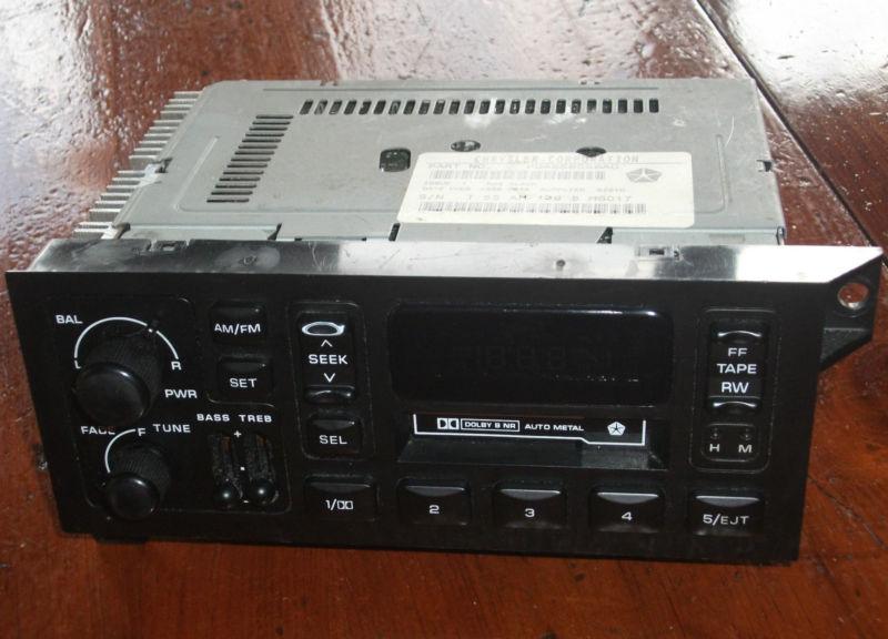 Jeep cherokee dodge chrysler radio stereo cassette player p04858556ad oem tested