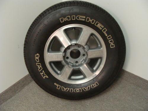 Olds bravada gm factory wheel w/michelin xw4 radial tire p235/70r15, new rim