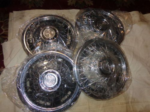 4 brand new 14 inch heavy chrome wire weel covers - new