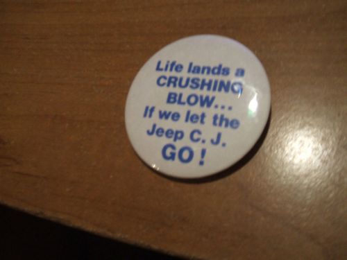 &#039;life lands a crushng  blow...if we let the jeep c. j. go!&#039; pin back badge