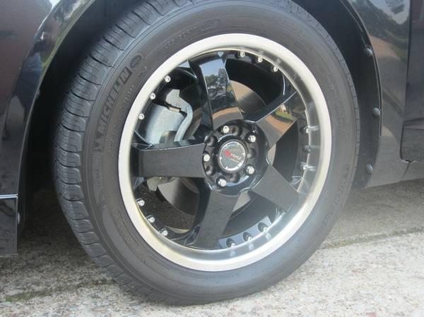 17" aluminum machined rim/black spoke wheels