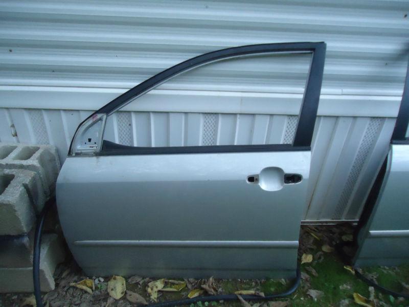 Front driver left side door with seal & panel toyota corolla 2000-05 14108