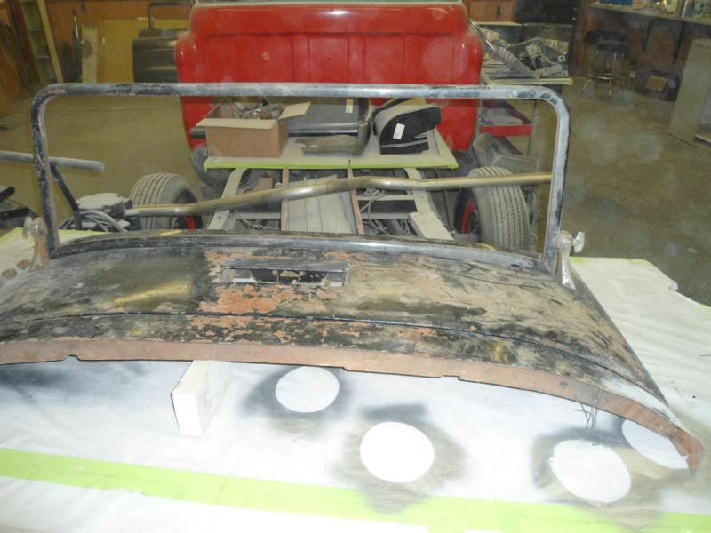 Dual cowl phaeton lid and windshield could fit cars such as stutz cord buick