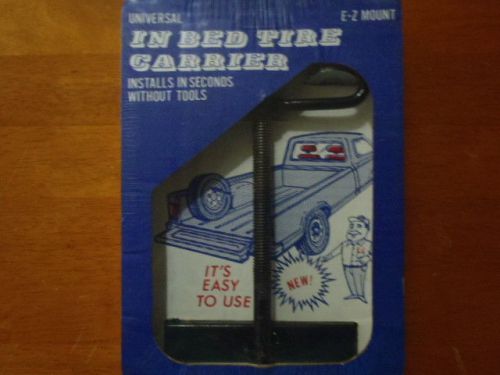 Fits all trucks - e-z mount universal in bed tire carrier - new in box