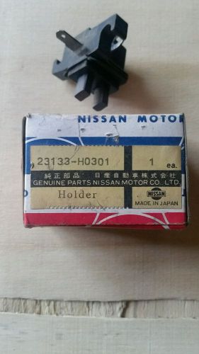 Nissan part # 23133-h0301 brush holder