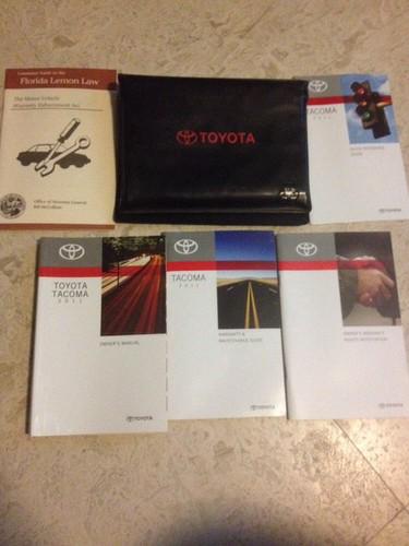2011 toyota tacoma owners manual set with case in great condition