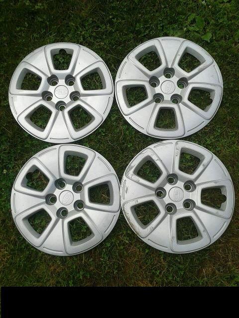 Set of 4 2012 kia soul hubcaps 
