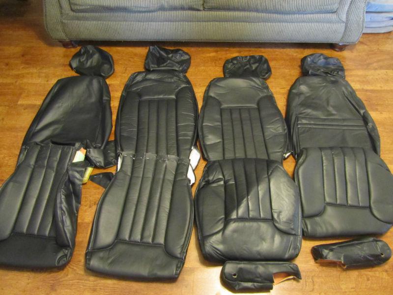 Hummer h1  seat covers   black vinyl  complete set of 4  with  two armrest