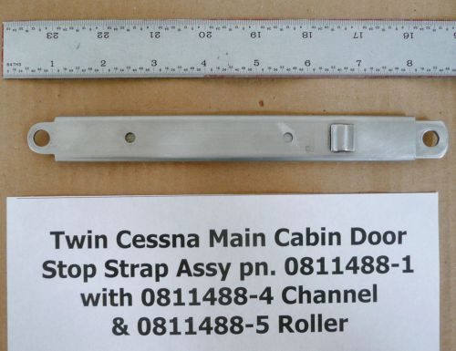 Twin cessna main cabin door stop strap assy pn. 0811488-1 with channel &amp; roller