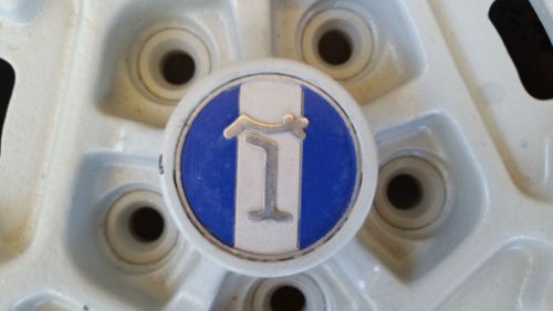 Custom cnc machined detomaso logos for stock pantera wheels