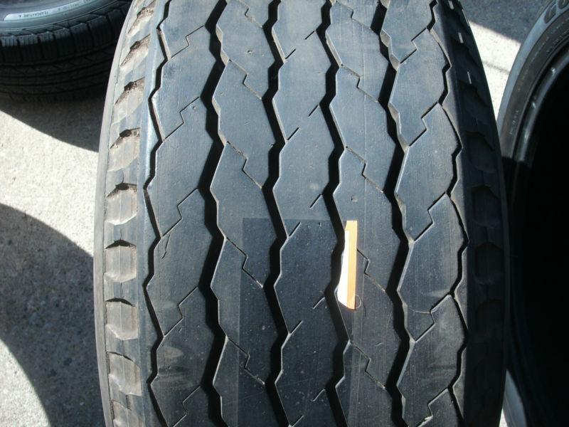 1) 10.0-16.5lt power king used tire.  d load range no repairs fast free shipping