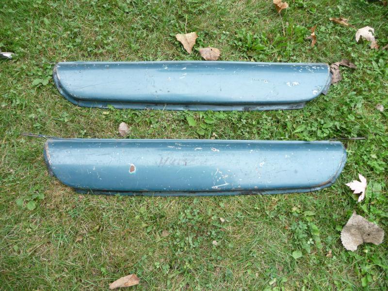 A pair of vintage green fender skirts.  gm?  ford?  1950s?  1960s?