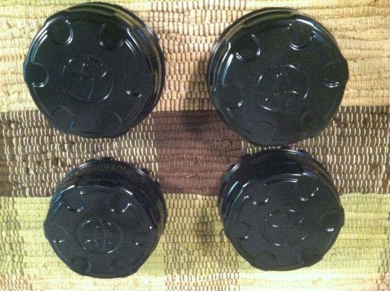 Wheel center caps from 1998 toyota tacoma prerunner - black - never used
