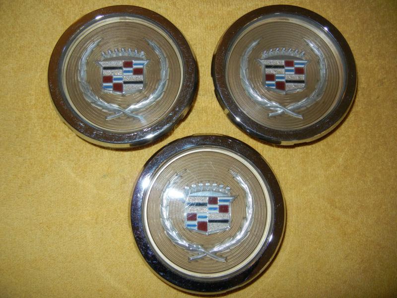 3 used cadillac hubcap center caps