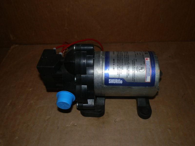 12 volt shurflo pump model 2088-422-144 ( used )