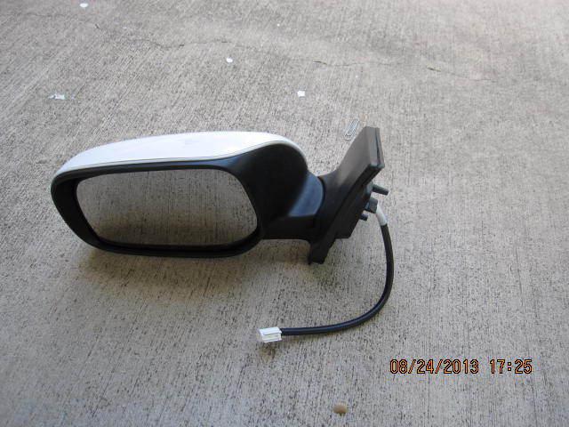 Toyota corolla 2009-2012 driver side mirror,white color,heated,part# 87909-02b40