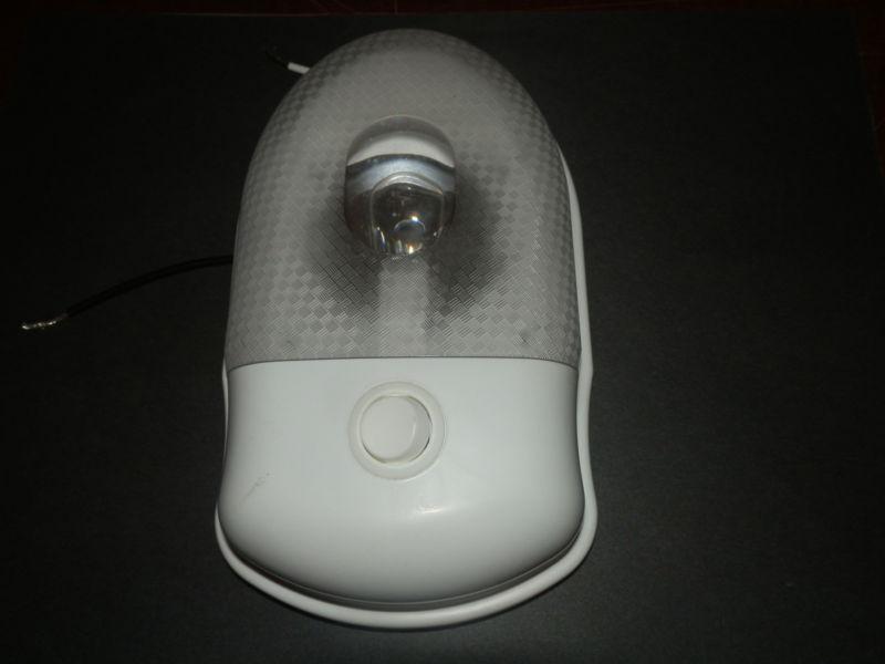 12 volt single light with clear cover ( used )