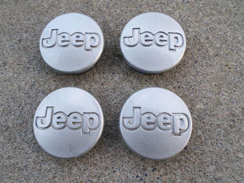 1996-2006 jeep grand cherokee, cherokee wrangler oem 2" silver center caps used 