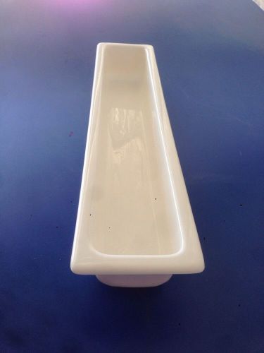 Formed plastic tray measures 32&#034; long by 7&#034; wide and is 5&#034; deep
