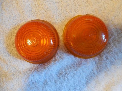 Kd lamp co. amber lens # 539. pair  3 1/8 in. x 7/8 in. small chip  my#855