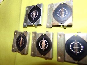 1966-70 lincoln  deluxe  seat belt button emblems /logos set of 5