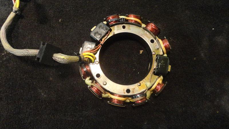 Used stator assy #0584849, 2001 115hp johnson 20" outboard motor 