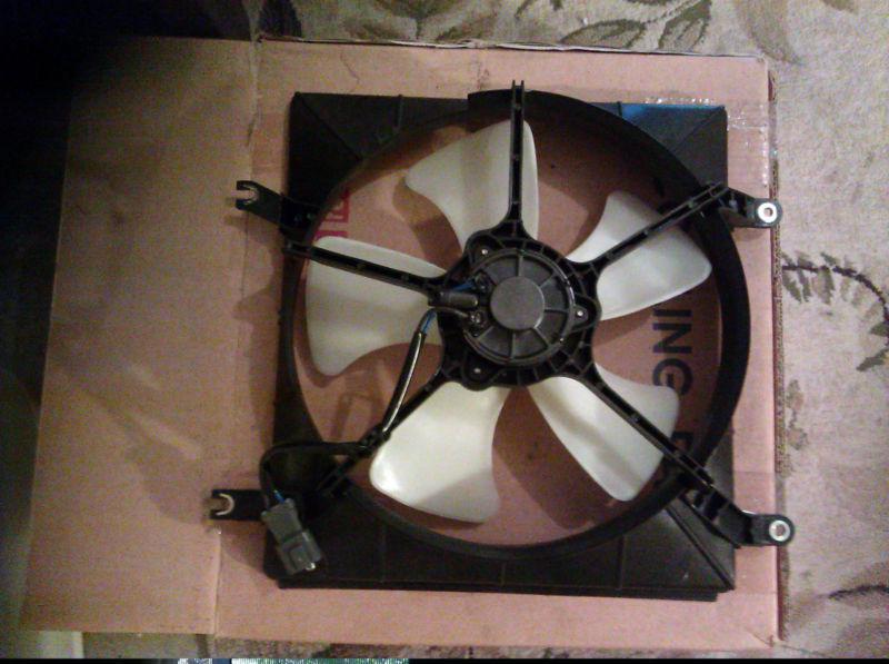 Brand new replacement radiator fan assembly for 2.2 l4 gas