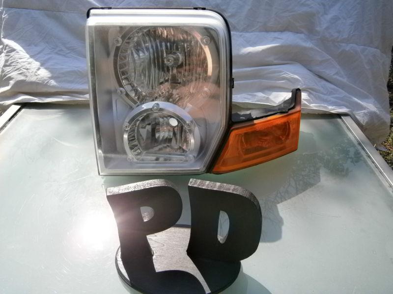 2006-2010 jeep commander lh headlight assembly  oem/warranty