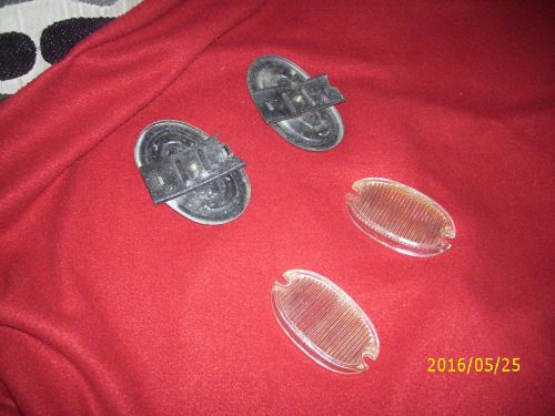 2 chevy backup light lens and 2 block off plates for &#039;57