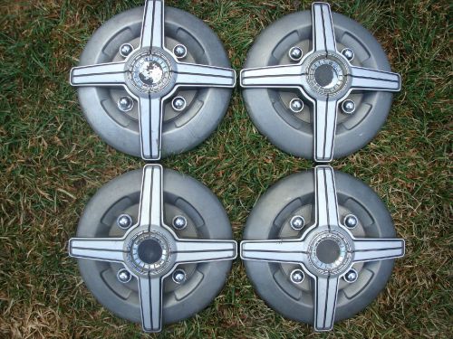 Set of four 1977 1978 1979 datsun 200sx 13&#034; center hub caps in great condition!