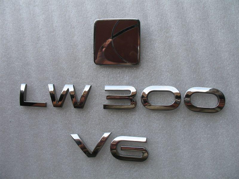 2002 saturn lw 300 lw300 v6 rear trunk chrome red emblem logo 02 oem decal set
