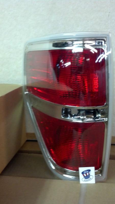2011-2012 ford f150 new oem drivers (lh) rear stop/tail lamp assy with chrome