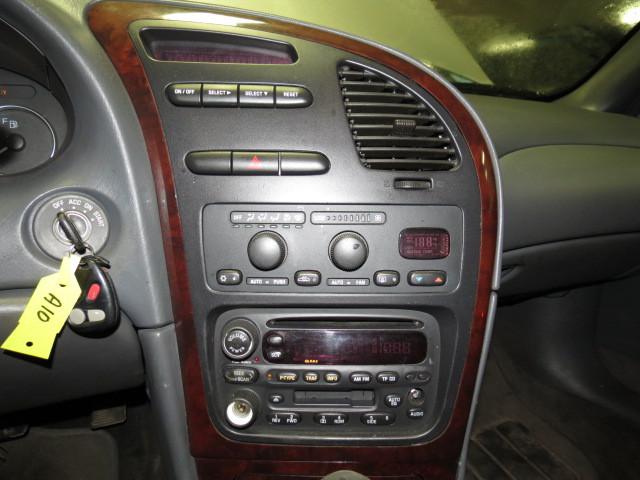 2001 oldsmobile aurora radio trim dash bezel 2571477