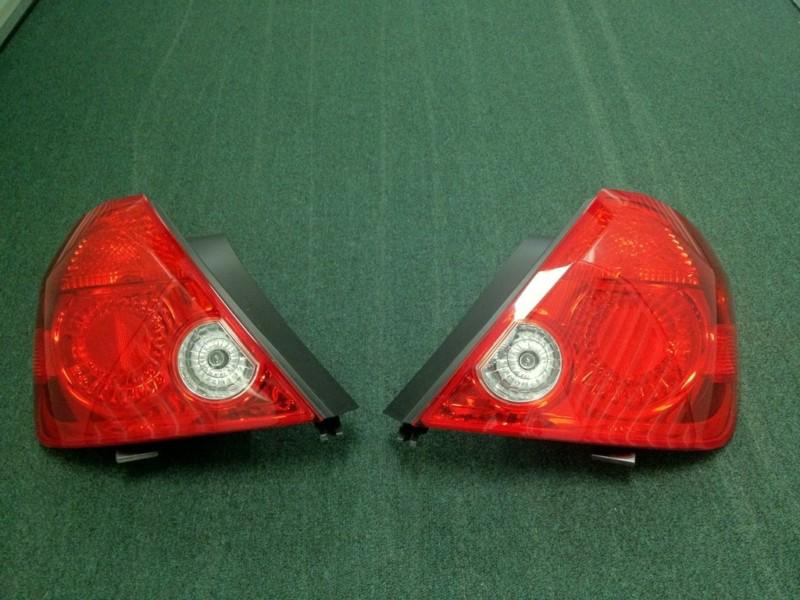 Scion tc 2005-2007 tail lights, left/right, factory oem.