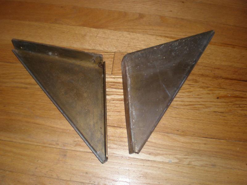 A pair of vintage 1964 chris craft  bronze windsheild corner support brackets