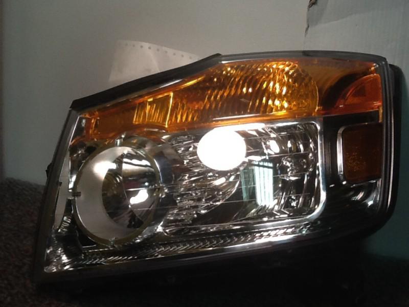   nissan armada headlight oem  08 09 11 12