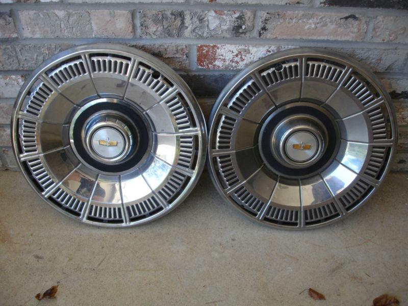 Set of 2 15 inch wheelcovers, hubcaps look like original equipment appear st.st.
