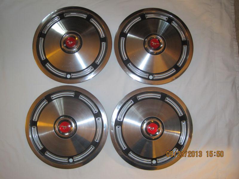 Factory  ford mustang 13 inch hubcaps  genuine oem 