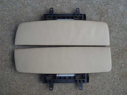 2002-08 bmw 745i,750i,   2 top doors for center console. other parts available.
