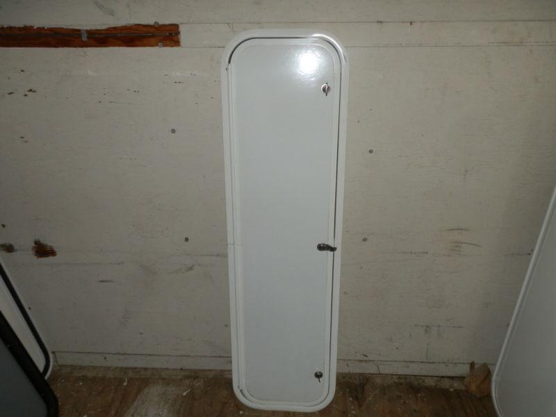 Rv cargo door r.o. 48" tall x 13" wide x 1 1/4" thick ( used )