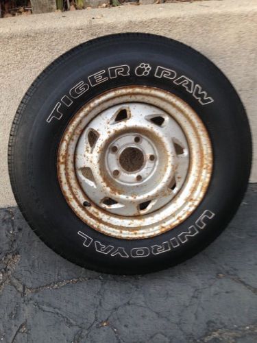 Rare vintage uniroyal tiger paw tire raised white lettering with paw
